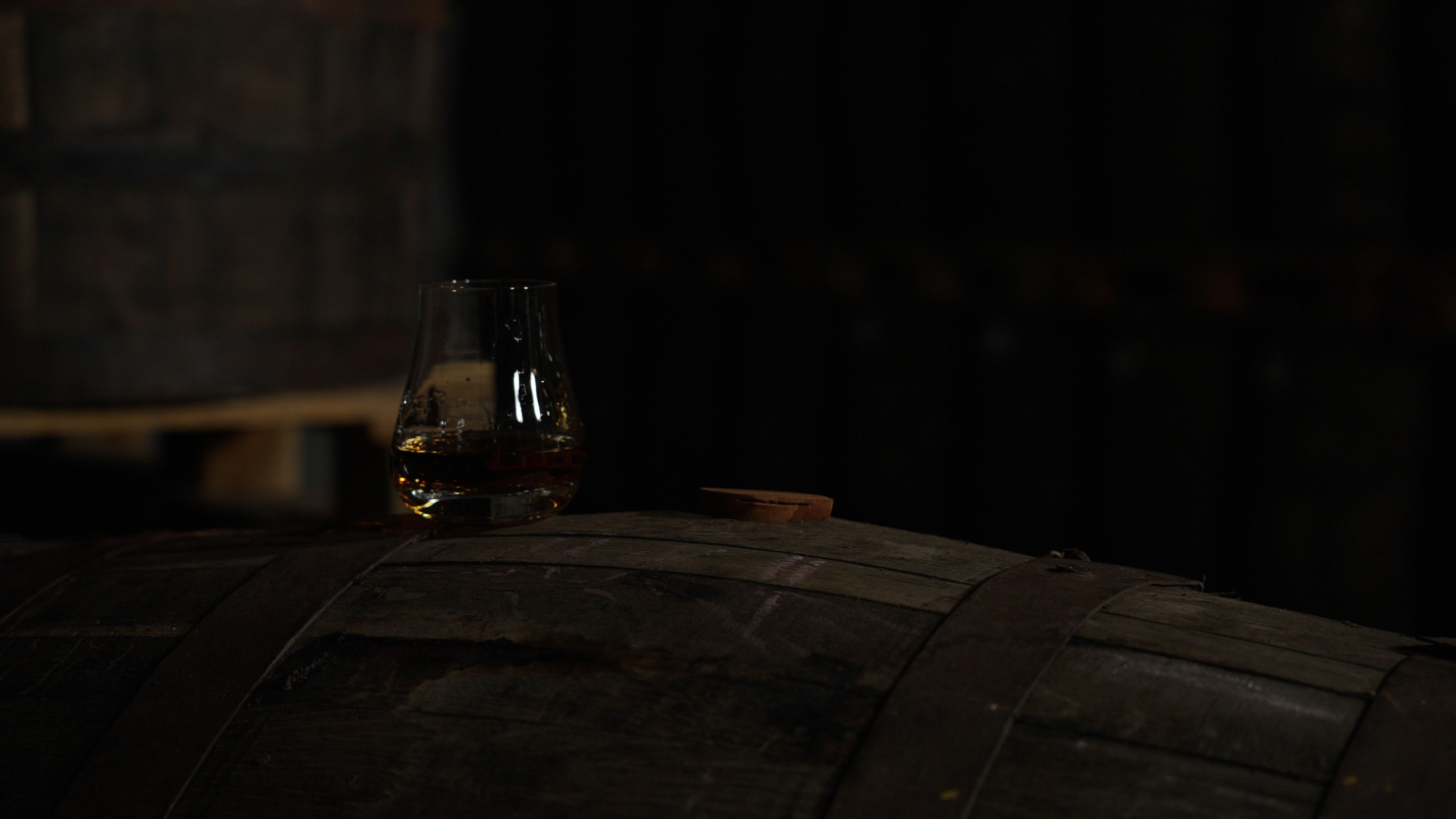 Aged rum cask and glass
